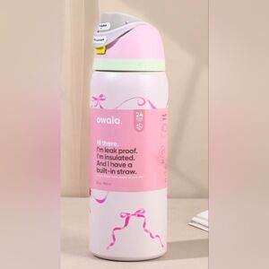 Owala Pink Insulated Water Bottle with Built-In Straw "Tied And True" Design.